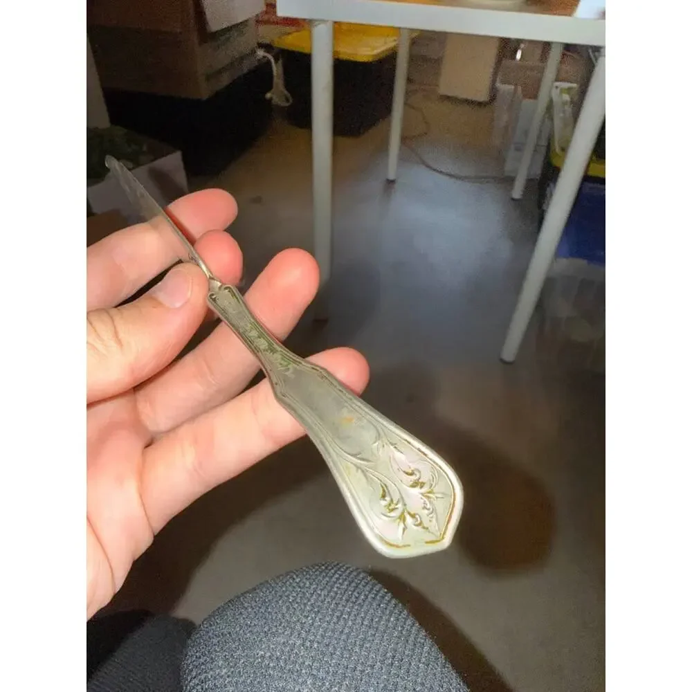 Antique Wm. Rogers Silverplate Twisted Butter Knife